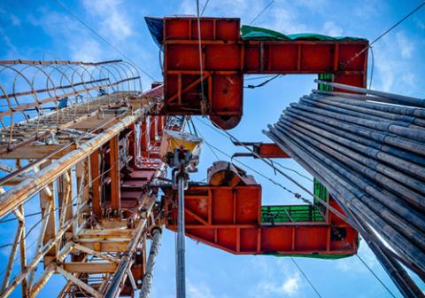 skyward view of drilling rig