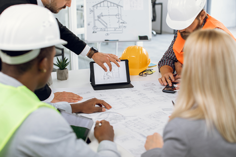 Business professionals working around a table