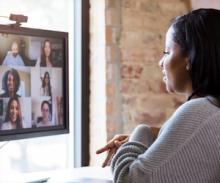 woman video conferencing with colleagues