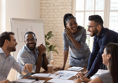 group of professionals in a fun meeting