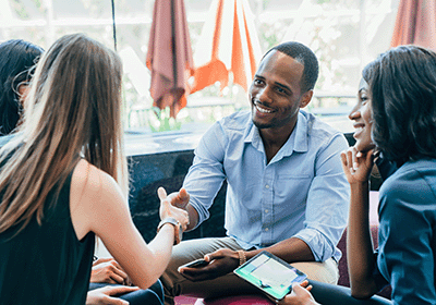 professionals smiling and shaking hands