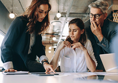 team poring over documents