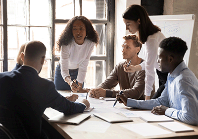 team members engaging in serious discussion