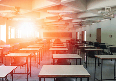 empty classroom cast in warm glow