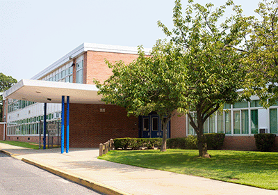 school building exterior on sunny day