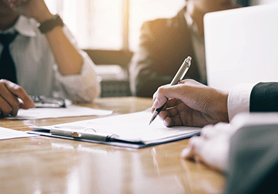 team reviews business document together