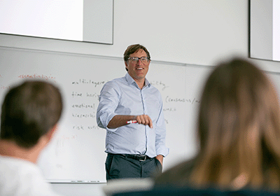 Personable professor presenting a lesson