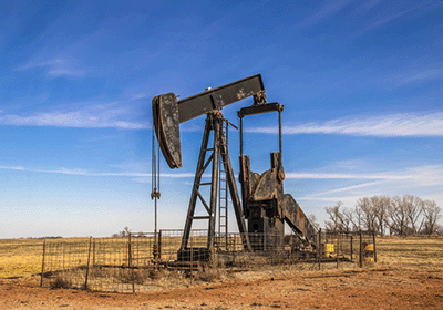 pumpjack on open plain