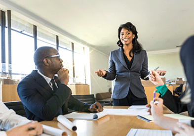 African american woman leads meeting confidently