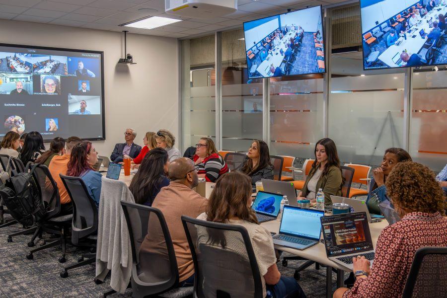 Business professionals in meeting room