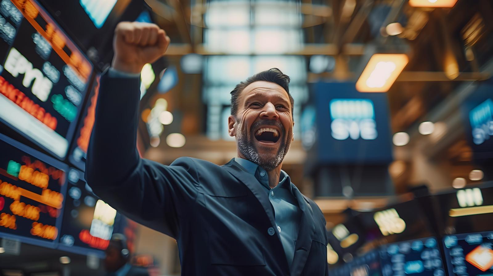 Excited business man in stock exchange