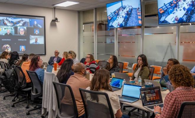 Business professionals in meeting room