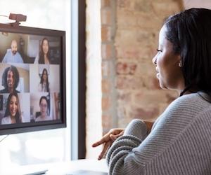 woman video conferencing with colleagues