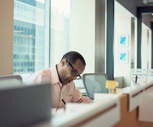 person working alone at a coworking desk