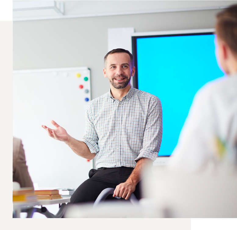 getting-started-support-from-employer_as232698480_1_photo-of-a-male-instructor-speaking-in-front-of-a-classroom.png